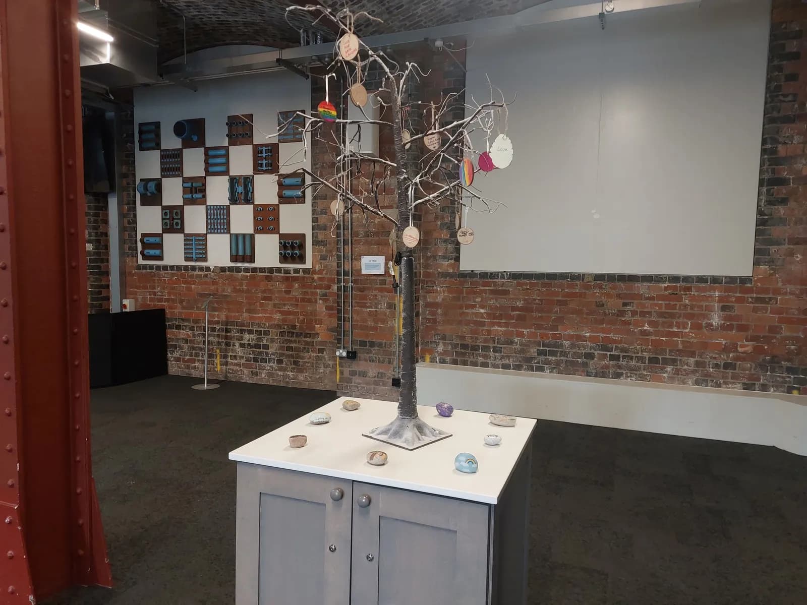 tree with fostering art and messages from local children