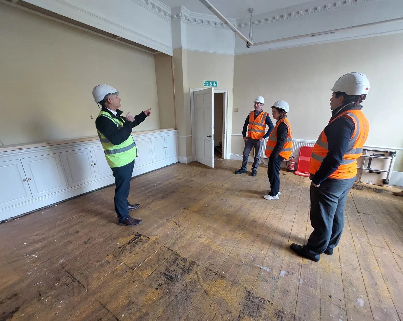 Contractors showing Cllr Courtliff and Councillor Tomlinson a room to be converted into a classroom